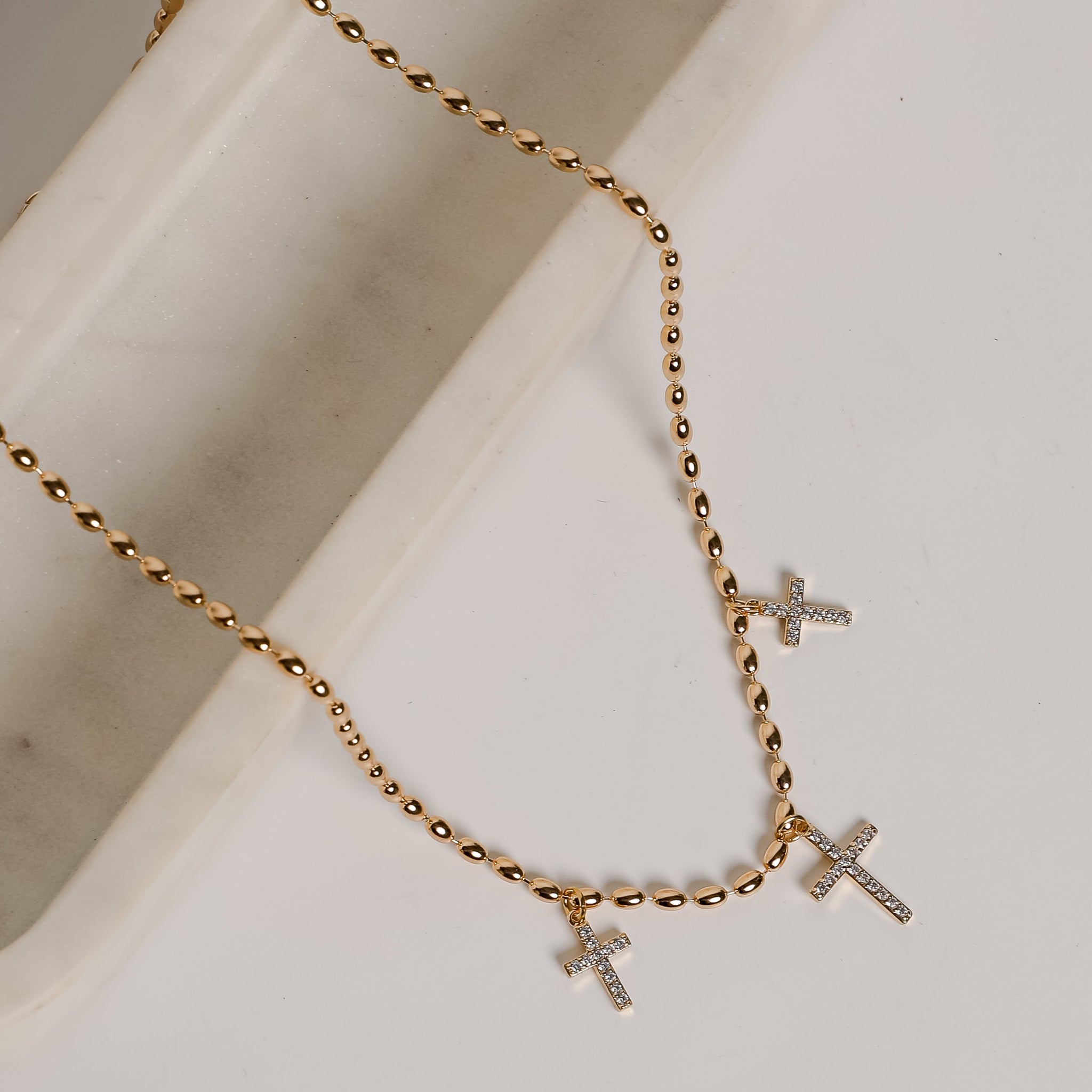 Naomi Gold Cross Charm Necklace